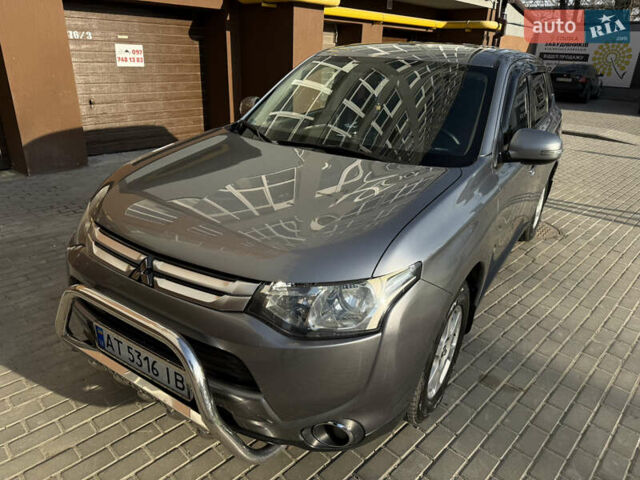 Серый Мицубиси Аутлендер, объемом двигателя 2 л и пробегом 137 тыс. км за 13700 $, фото 1 на Automoto.ua