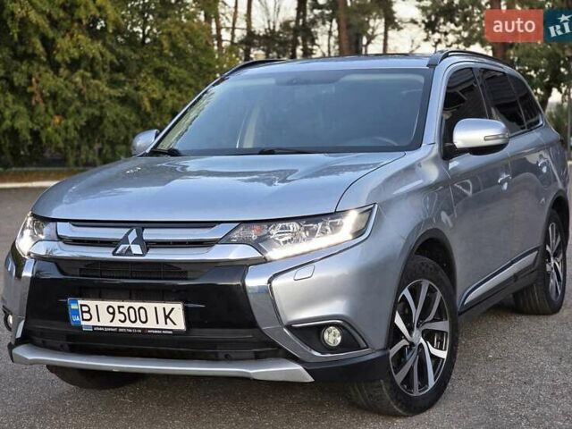 Серый Мицубиси Аутлендер, объемом двигателя 2.36 л и пробегом 164 тыс. км за 17900 $, фото 1 на Automoto.ua