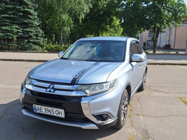 Серый Мицубиси Аутлендер, объемом двигателя 2.4 л и пробегом 160 тыс. км за 14200 $, фото 1 на Automoto.ua