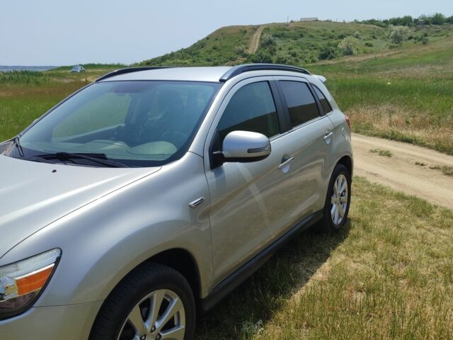 Серый Мицубиси Аутлендер, объемом двигателя 2.4 л и пробегом 132 тыс. км за 12300 $, фото 1 на Automoto.ua