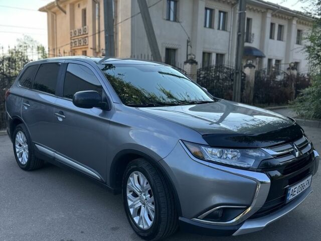 Серый Мицубиси Аутлендер, объемом двигателя 2.4 л и пробегом 140 тыс. км за 14499 $, фото 1 на Automoto.ua