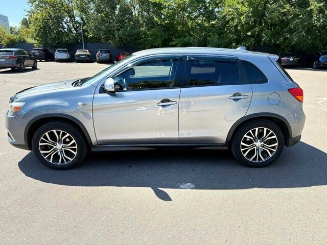 Серый Мицубиси Аутлендер, объемом двигателя 2 л и пробегом 167 тыс. км за 12900 $, фото 1 на Automoto.ua