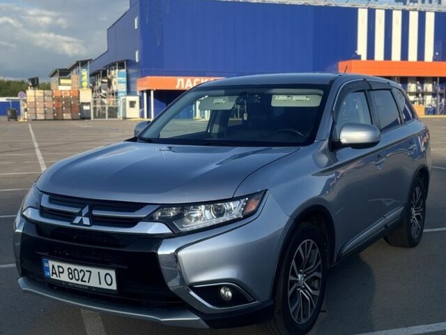 Серый Мицубиси Аутлендер, объемом двигателя 2.4 л и пробегом 178 тыс. км за 14500 $, фото 1 на Automoto.ua