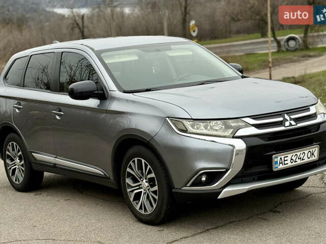 Серый Мицубиси Аутлендер, объемом двигателя 2.4 л и пробегом 148 тыс. км за 12500 $, фото 1 на Automoto.ua