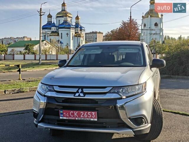 Серый Мицубиси Аутлендер, объемом двигателя 2.4 л и пробегом 208 тыс. км за 12200 $, фото 1 на Automoto.ua