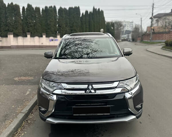 Сірий Міцубісі Аутлендер, об'ємом двигуна 2.36 л та пробігом 48 тис. км за 18000 $, фото 1 на Automoto.ua