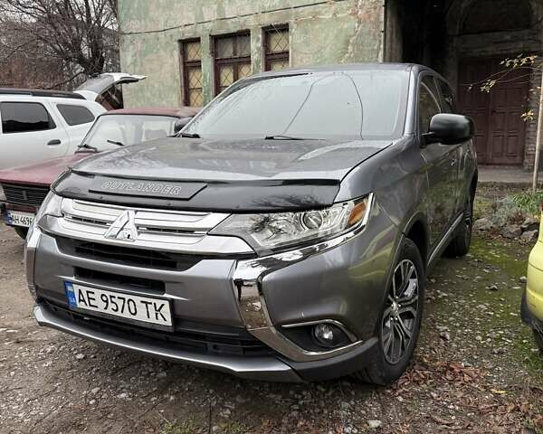 Сірий Міцубісі Аутлендер, об'ємом двигуна 2.36 л та пробігом 162 тис. км за 12300 $, фото 1 на Automoto.ua
