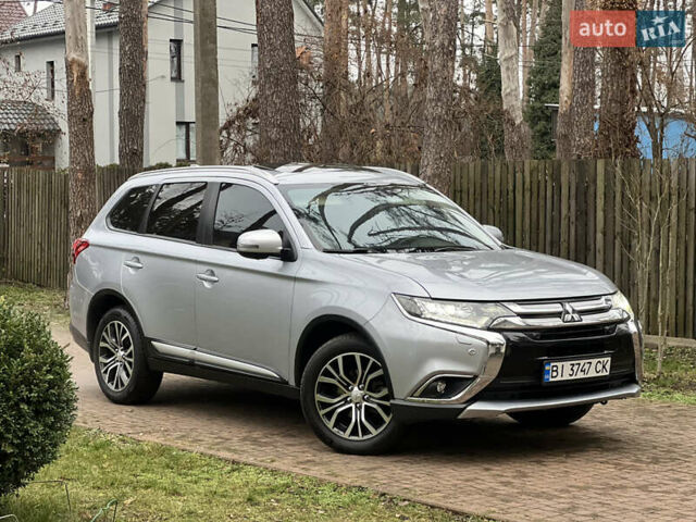 Серый Мицубиси Аутлендер, объемом двигателя 2.4 л и пробегом 189 тыс. км за 16950 $, фото 1 на Automoto.ua