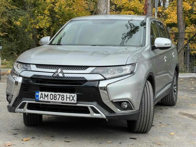 Серый Мицубиси Аутлендер, объемом двигателя 2.4 л и пробегом 110 тыс. км за 15950 $, фото 1 на Automoto.ua