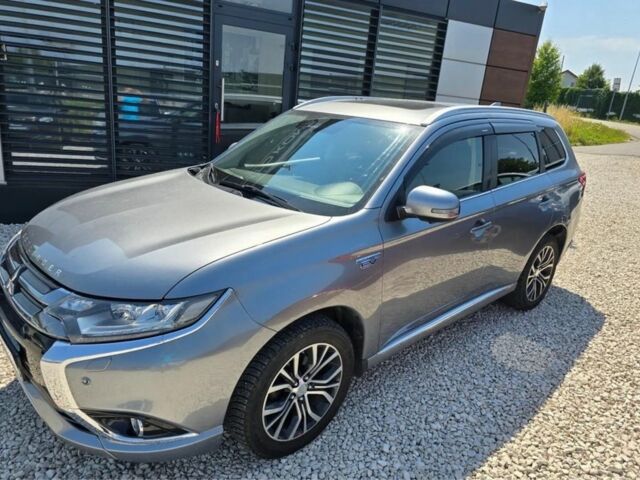 Серый Мицубиси Аутлендер, объемом двигателя 2.4 л и пробегом 89 тыс. км за 9900 $, фото 1 на Automoto.ua