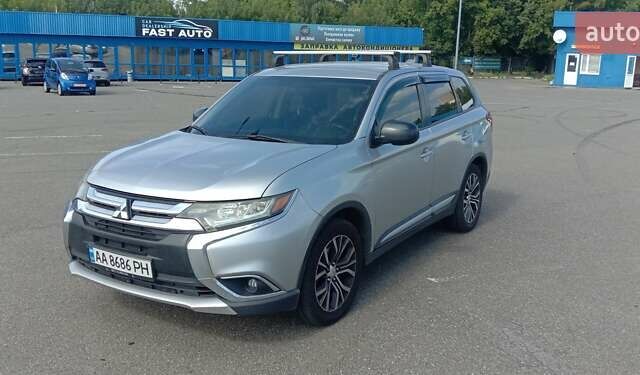 Сірий Міцубісі Аутлендер, об'ємом двигуна 2.36 л та пробігом 100 тис. км за 17700 $, фото 1 на Automoto.ua