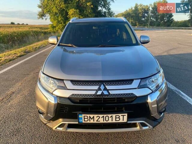 Серый Мицубиси Аутлендер, объемом двигателя 2.36 л и пробегом 104 тыс. км за 16700 $, фото 1 на Automoto.ua
