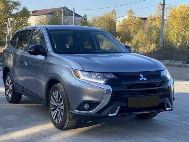 Сірий Міцубісі Аутлендер, об'ємом двигуна 2.4 л та пробігом 133 тис. км за 14000 $, фото 1 на Automoto.ua