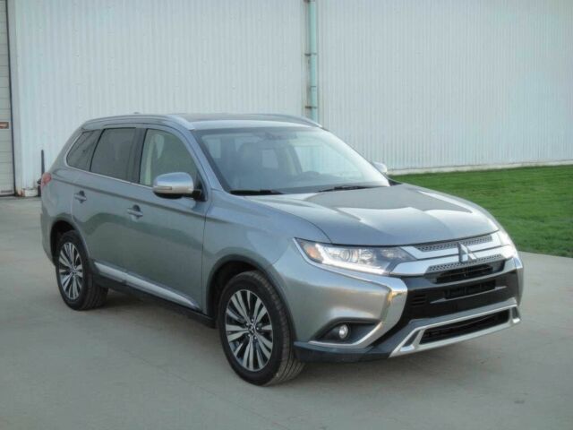 Серый Мицубиси Аутлендер, объемом двигателя 2.4 л и пробегом 42 тыс. км за 10400 $, фото 1 на Automoto.ua