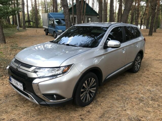 Сірий Міцубісі Аутлендер, об'ємом двигуна 2.4 л та пробігом 107 тис. км за 15800 $, фото 1 на Automoto.ua