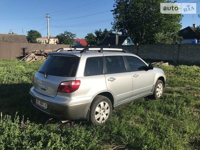 Сірий Міцубісі Аутлендер, об'ємом двигуна 2 л та пробігом 230 тис. км за 8500 $, фото 1 на Automoto.ua