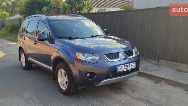 Синий Мицубиси Аутлендер, объемом двигателя 1.97 л и пробегом 196 тыс. км за 8950 $, фото 1 на Automoto.ua