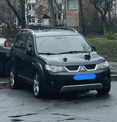 Синій Міцубісі Аутлендер, об'ємом двигуна 2 л та пробігом 388 тис. км за 4800 $, фото 1 на Automoto.ua