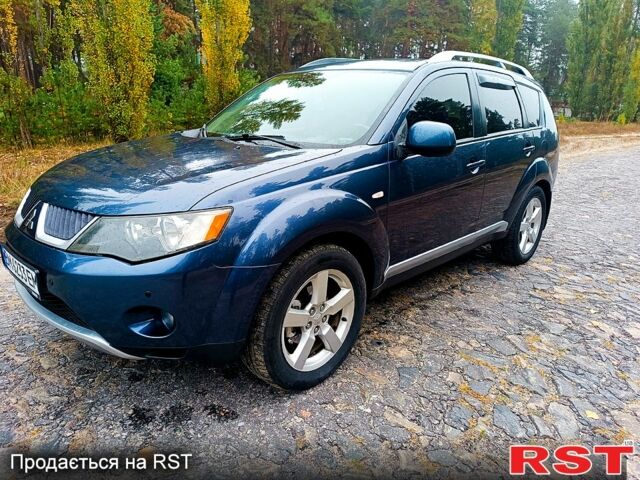 Синій Міцубісі Аутлендер, об'ємом двигуна 2.4 л та пробігом 210 тис. км за 8100 $, фото 1 на Automoto.ua