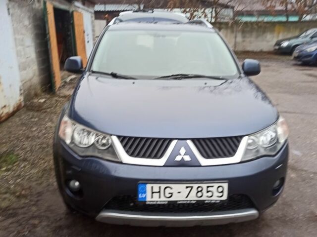 Синий Мицубиси Аутлендер, объемом двигателя 2 л и пробегом 306 тыс. км за 5200 $, фото 1 на Automoto.ua