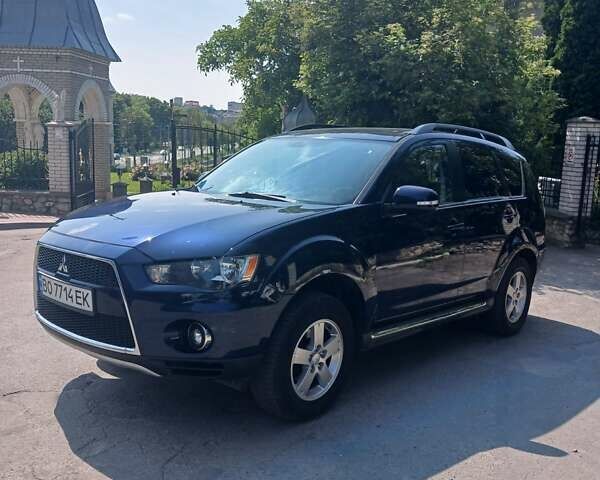 Синий Мицубиси Аутлендер, объемом двигателя 2 л и пробегом 268 тыс. км за 10200 $, фото 1 на Automoto.ua
