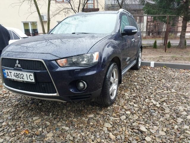 Синий Мицубиси Аутлендер, объемом двигателя 2.2 л и пробегом 220 тыс. км за 11450 $, фото 1 на Automoto.ua