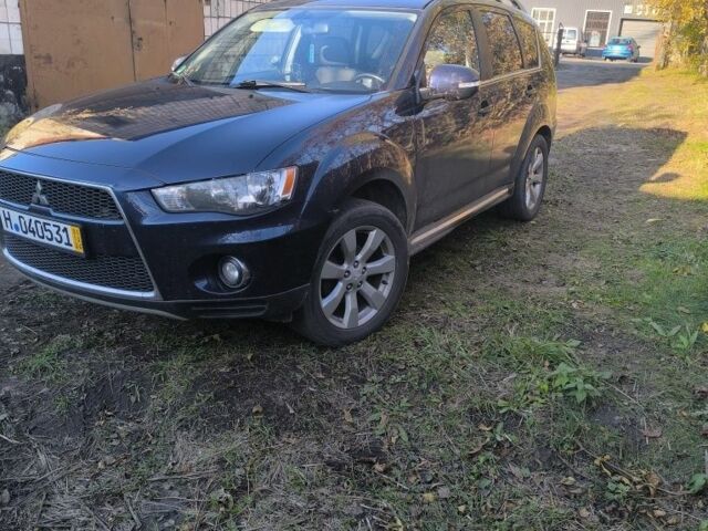 Синий Мицубиси Аутлендер, объемом двигателя 2.2 л и пробегом 284 тыс. км за 5700 $, фото 1 на Automoto.ua