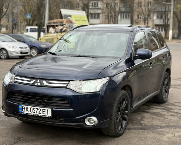 Синій Міцубісі Аутлендер, об'ємом двигуна 2.4 л та пробігом 212 тис. км за 10000 $, фото 1 на Automoto.ua