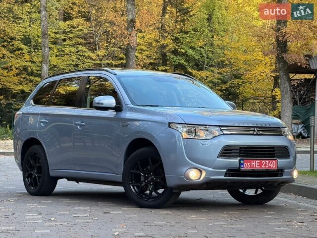 Синій Міцубісі Аутлендер, об'ємом двигуна 2 л та пробігом 200 тис. км за 14299 $, фото 1 на Automoto.ua