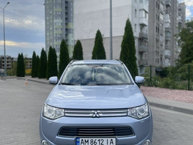 Синий Мицубиси Аутлендер, объемом двигателя 2 л и пробегом 153 тыс. км за 15499 $, фото 1 на Automoto.ua