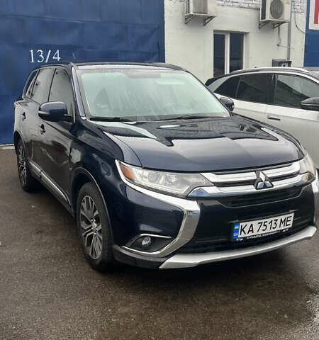 Синий Мицубиси Аутлендер, объемом двигателя 2.36 л и пробегом 203 тыс. км за 14200 $, фото 1 на Automoto.ua