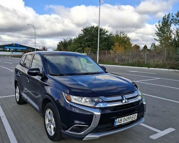 Синій Міцубісі Аутлендер, об'ємом двигуна 2.36 л та пробігом 161 тис. км за 14400 $, фото 1 на Automoto.ua