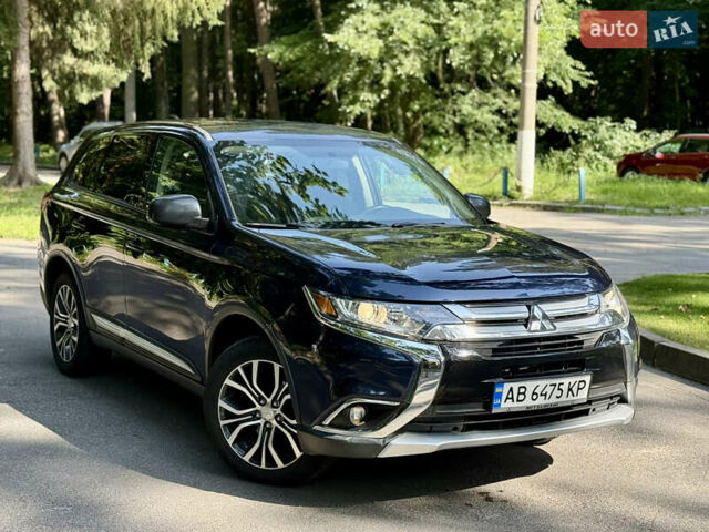Синій Міцубісі Аутлендер, об'ємом двигуна 2.4 л та пробігом 94 тис. км за 15200 $, фото 1 на Automoto.ua