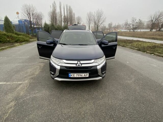 Синий Мицубиси Аутлендер, объемом двигателя 3 л и пробегом 120 тыс. км за 14500 $, фото 1 на Automoto.ua