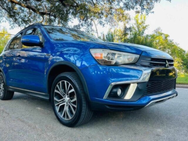 Синий Мицубиси Аутлендер, объемом двигателя 2.4 л и пробегом 45 тыс. км за 10700 $, фото 1 на Automoto.ua