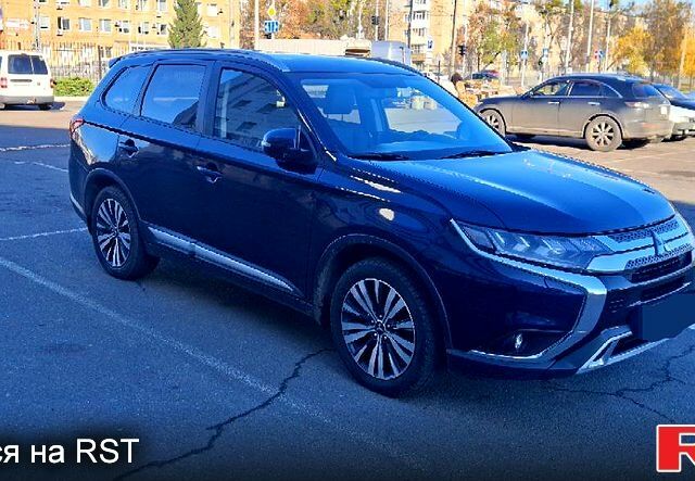 Синій Міцубісі Аутлендер, об'ємом двигуна 2.4 л та пробігом 67 тис. км за 24000 $, фото 1 на Automoto.ua