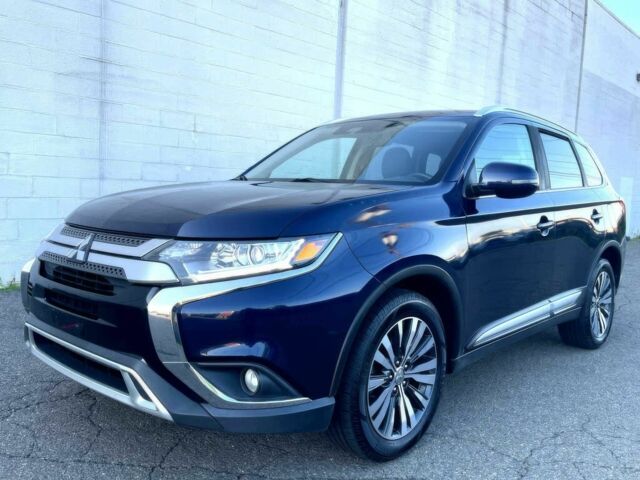 Синій Міцубісі Аутлендер, об'ємом двигуна 2.4 л та пробігом 40 тис. км за 5800 $, фото 1 на Automoto.ua