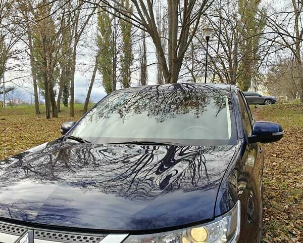 Синий Мицубиси Аутлендер, объемом двигателя 2 л и пробегом 68 тыс. км за 22000 $, фото 1 на Automoto.ua