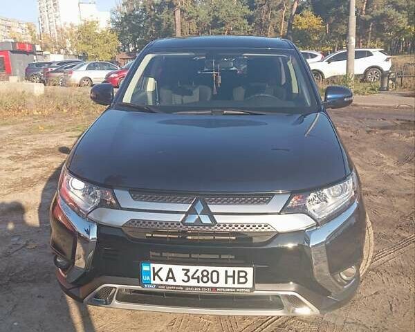 Синий Мицубиси Аутлендер, объемом двигателя 2 л и пробегом 21 тыс. км за 23600 $, фото 1 на Automoto.ua