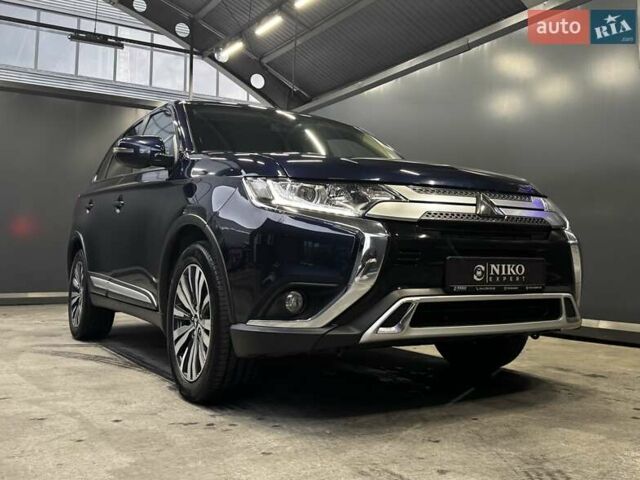 Синий Мицубиси Аутлендер, объемом двигателя 2 л и пробегом 62 тыс. км за 20500 $, фото 1 на Automoto.ua