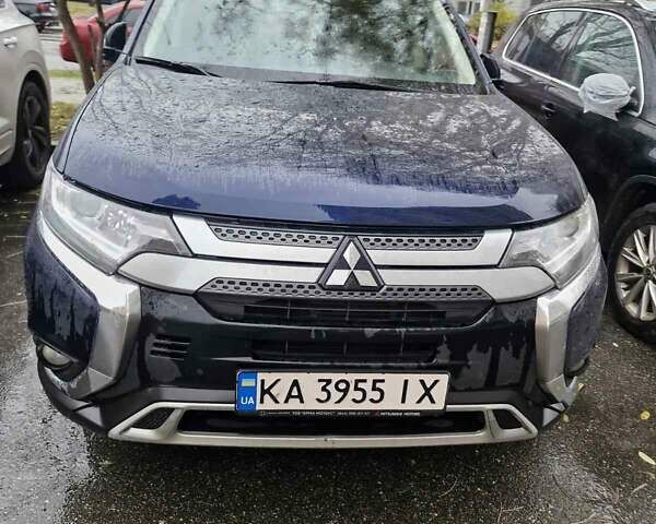 Синий Мицубиси Аутлендер, объемом двигателя 2 л и пробегом 73 тыс. км за 28500 $, фото 1 на Automoto.ua