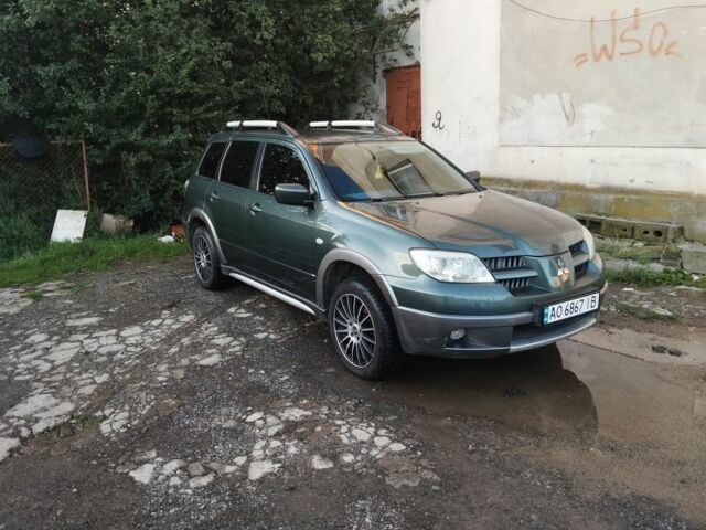 Зелений Міцубісі Аутлендер, об'ємом двигуна 2.4 л та пробігом 3 тис. км за 6500 $, фото 1 на Automoto.ua