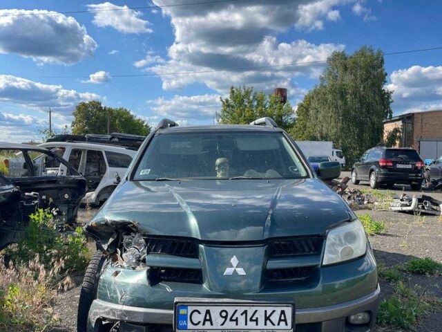 Зелений Міцубісі Аутлендер, об'ємом двигуна 2.4 л та пробігом 240 тис. км за 3000 $, фото 1 на Automoto.ua