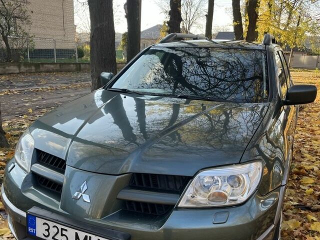 Міцубісі Аутлендер 2007 у Тульчине на Automoto.ua Зелений Міцубісі Аутлендер, об'ємом двигуна 2.4 л та пробігом 147 тис. км за 4550 $, фото 1 на Automoto.ua
