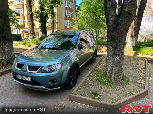 Зеленый Мицубиси Аутлендер, объемом двигателя 3 л и пробегом 233 тыс. км за 9000 $, фото 1 на Automoto.ua