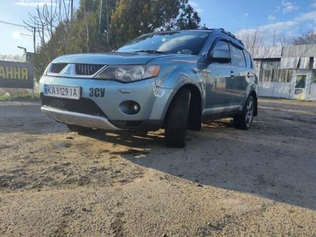 Зеленый Мицубиси Аутлендер, объемом двигателя 3 л и пробегом 235 тыс. км за 7000 $, фото 1 на Automoto.ua