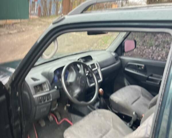 Зелений Міцубісі Паджеро Пінін, об'ємом двигуна 1.83 л та пробігом 890 тис. км за 2100 $, фото 1 на Automoto.ua