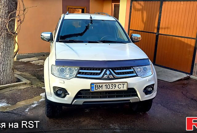 Білий Міцубісі Паджеро Спорт, об'ємом двигуна 2.5 л та пробігом 162 тис. км за 16500 $, фото 1 на Automoto.ua