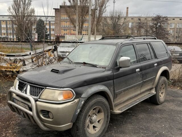 Бежевый Мицубиси Паджеро Спорт, объемом двигателя 2.8 л и пробегом 200 тыс. км за 2472 $, фото 1 на Automoto.ua