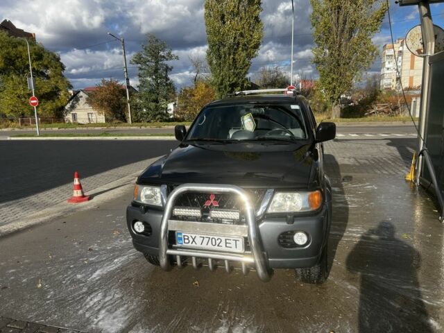 Черный Мицубиси Паджеро Спорт, объемом двигателя 3 л и пробегом 400 тыс. км за 6500 $, фото 1 на Automoto.ua